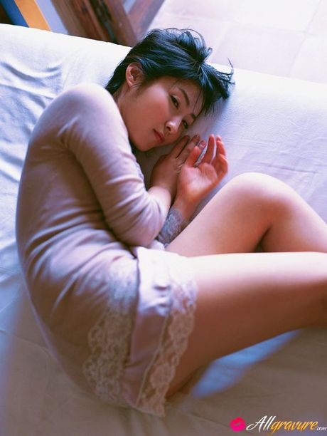 Sensual gravure idol beauty laying around in her lace lingerie