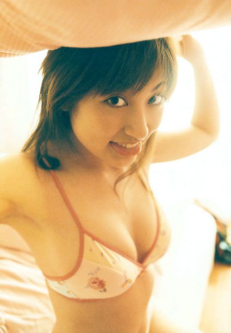 Divine asian babe with plump bouncy boobs in a white bikini