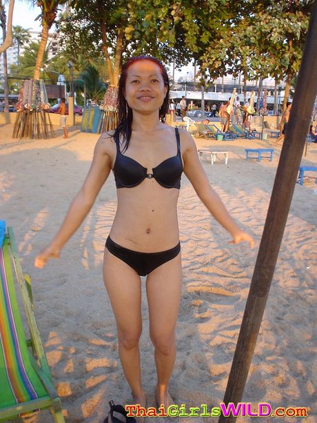 Cute Thai twins pose and have fun for the camera