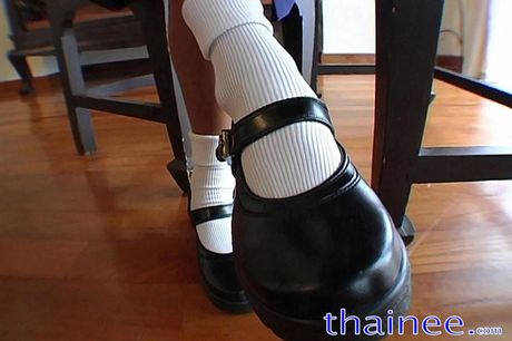 Thainee pretending to be a school girl