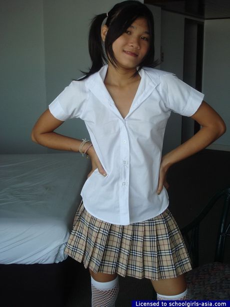 Adorable 18 yo schoolgirl flashing her cute peach