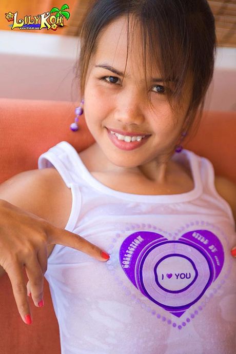 Asian panties are pulled between soft hairless pussy lips