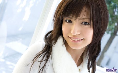 Naughty Asian schoolgirl is thinking about showing off the rest of her fine self