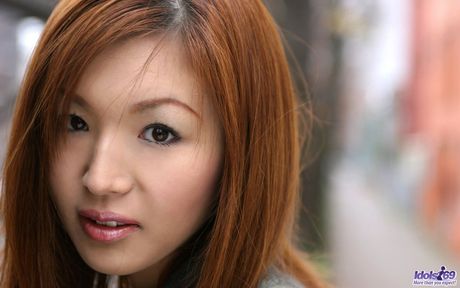 Asian beauty enjoys showing off her fine tits and fuckable round ass