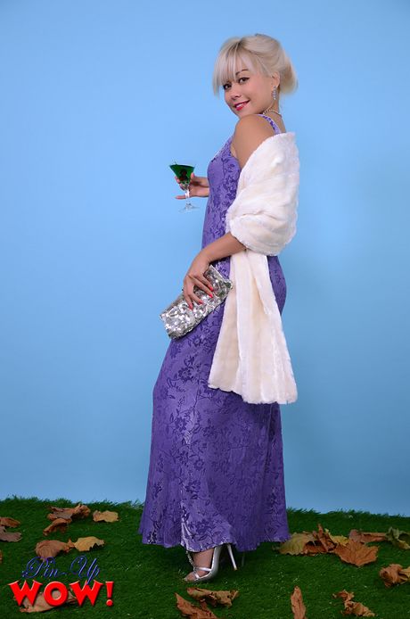 Asian babe Petra strips and shows her big racks and ass in a solo