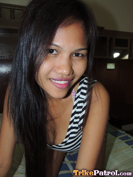 Asian teen Mishelle strips and shows her small tits and hot ass