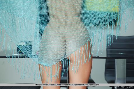 Asian teen Kimiko shows her tiny tits and spreads her shaved pussy