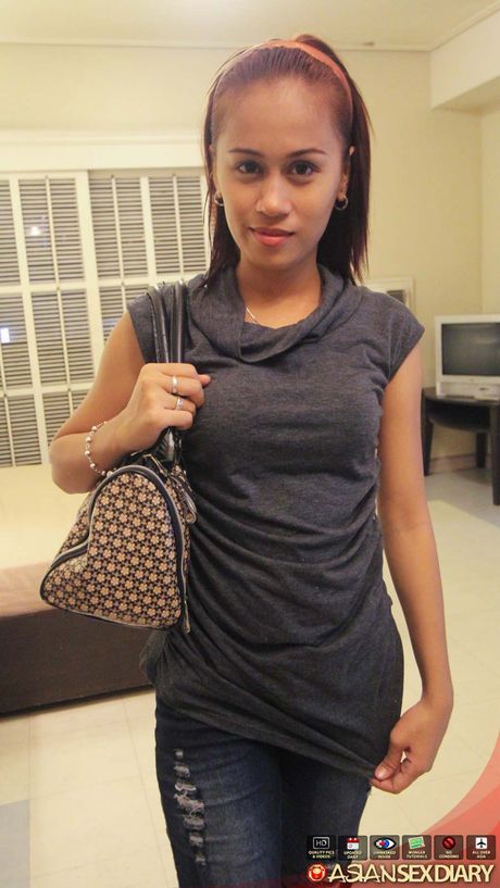 Asian teen Lou strips and shows her tiny tits and ass in a public place