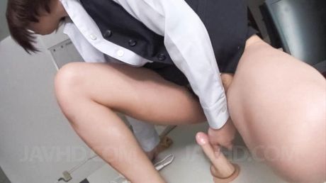 Kaoru Natsuki Asian puts vibrator on clit and dildo in hairy slit