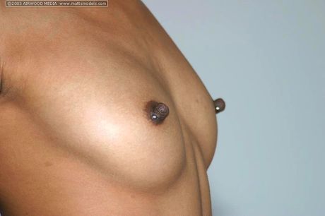 Asian teen Lily Tai strips and shows her perfect ass and tits