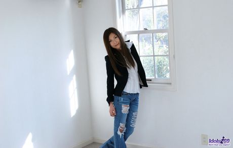 Lovely Asian tramp shows off her great tits and groomed twat with much pleasure