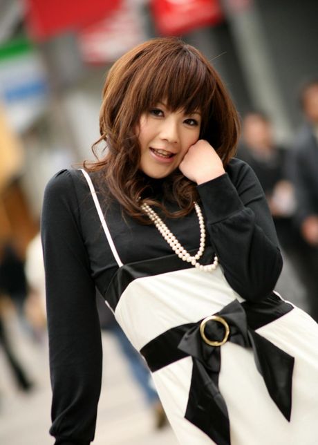 Asian trollop dreams of being a sexual object of lust as she poses for pictures