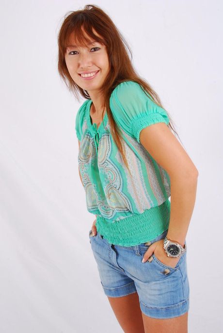 Asian amateur teen strips off and reveals her small tits and pussy