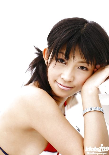 Luscious japanese young Sasa Handa in bikini exposing big hooters and sexy butt