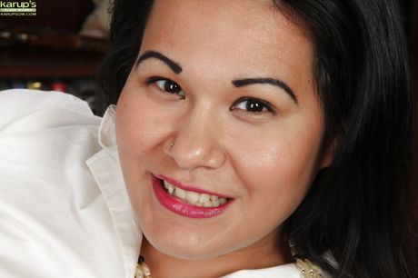 Very attractive oriental mature Susie Jhonson in lingerie exposes small tits and bald pussy